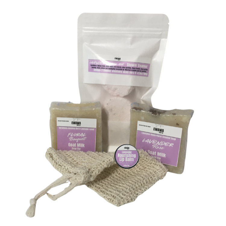Set of skincare products including a bag, bar, and lip balm on a white background